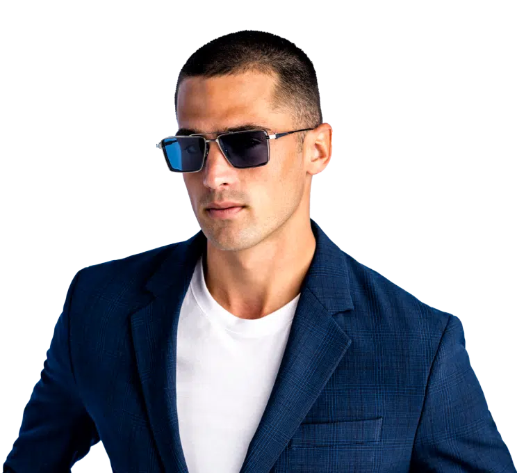 Explore Designer Sunglasses & Luxury Eyewear | Edward Beiner | Caucasian Man in a blue suit wearing Designer Sunglasses
